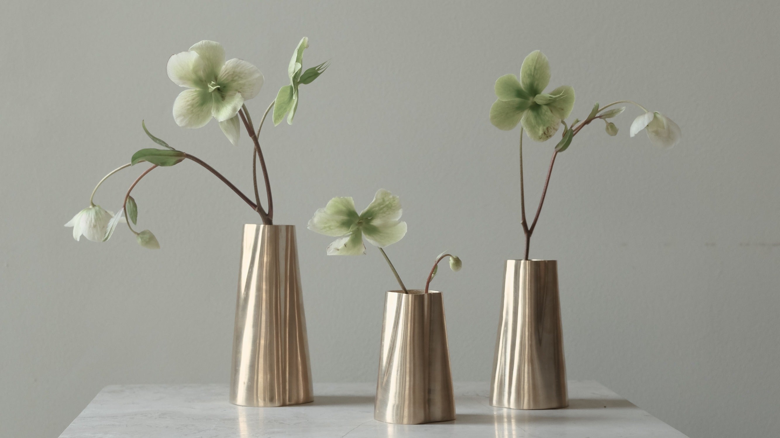 BRANDT Collective - vases and candleholders in marble, burnished brass and satin brass.