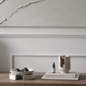 AURA oil burner in chalk grey beige marble and brass bowl by BRANDT Collective