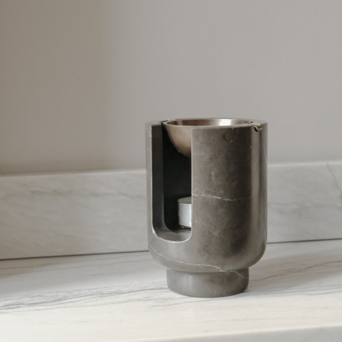 AURA oil burner in Royal grey marble and burnished brass bowl by BRANDT Collective