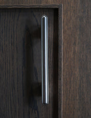 BUTTON pull bar 250 mm in satin nickel by BRANDT Collective. A hardware collection in collab with Norm architects consisting of knobs, T-bars and pull bars.