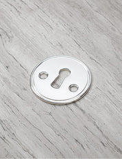 CHISEL keyhole in Polished Nickel. Luxury door hardware by BRANDT Collective.