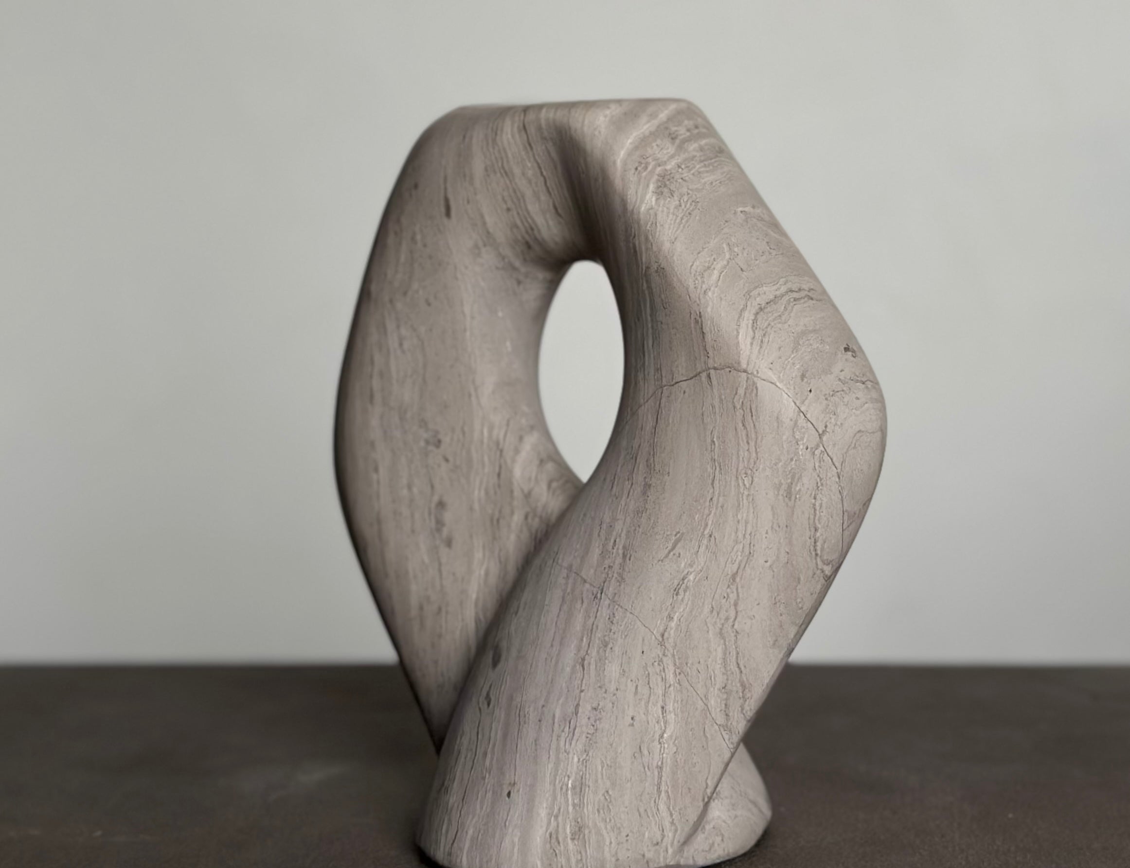 CRATOR sculpture in CHALK beige marble is designed by Julie Brandt for BRANDT Collective.