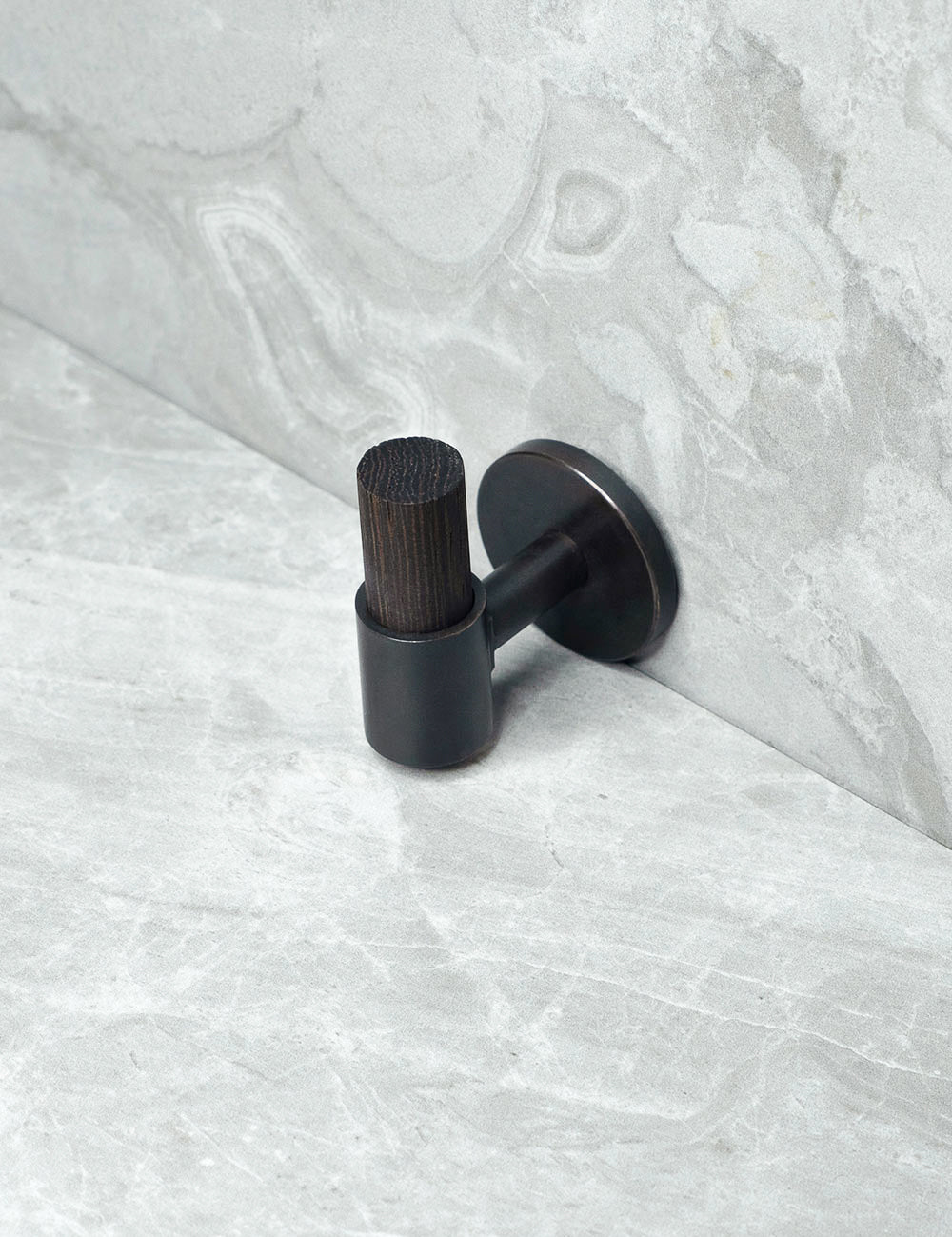 SIGNATURE 30 END knob in Nearly Black/Wenge. Luxury cabinet hardware made of solid brass by BRANDT Collective.