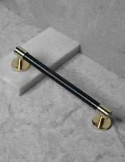 END 30 pull bar handle 192 mm in Polished Brass/Black Horn. Luxury cabinet hardware made of solid brass by BRANDT Collective. 