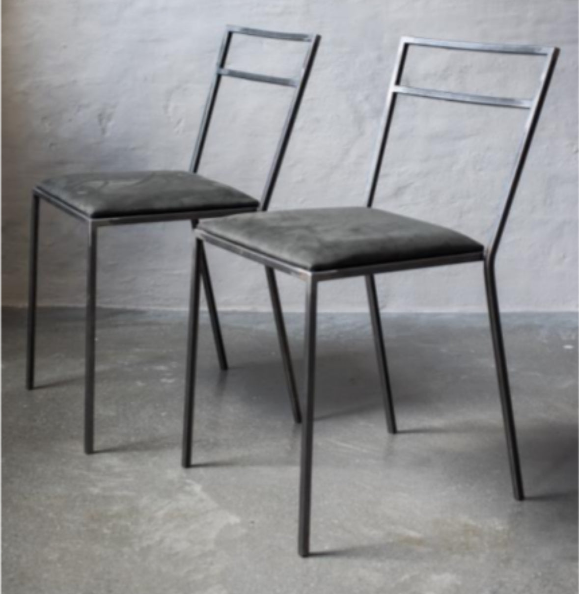 AMASS Metal frame chair with leather upholstered seat