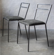 AMASS Metal frame chair with leather upholstered seat