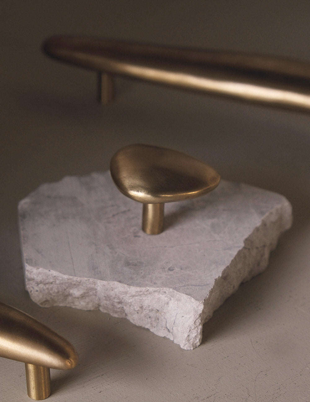 NOBLE knob in satin brass made of solid brass designed by Julie Brandt for BRANDT Collective