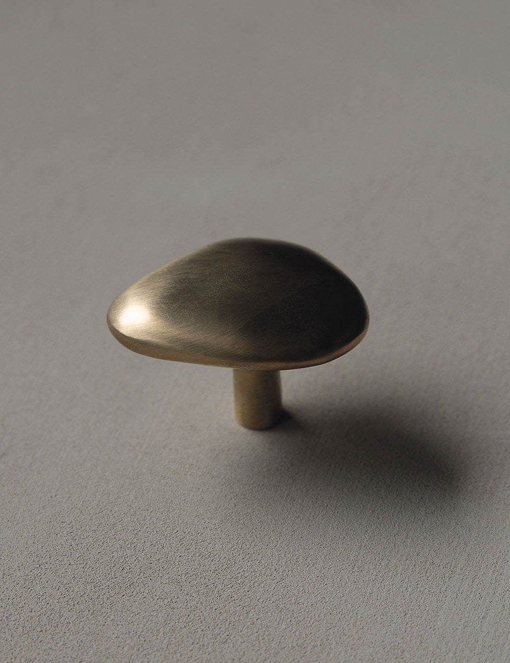 NOBLE knob in satin brass made of solid brass designed by Julie Brandt for BRANDT Collective