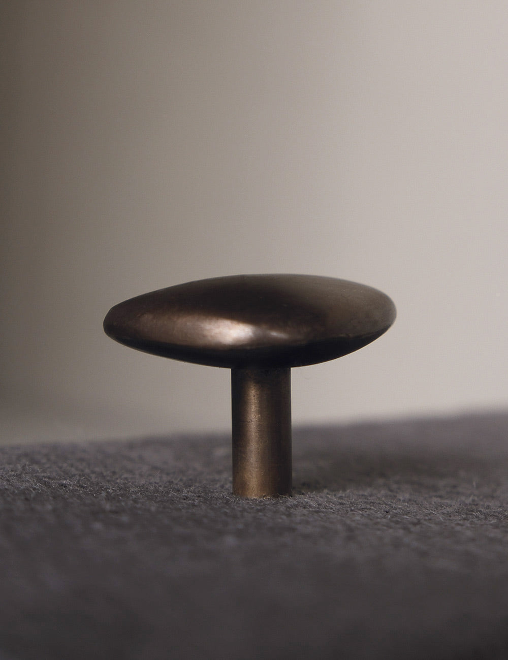 NOBLE knob in burnished brass made of solid brass designed by Julie Brandt for BRANDT Collective