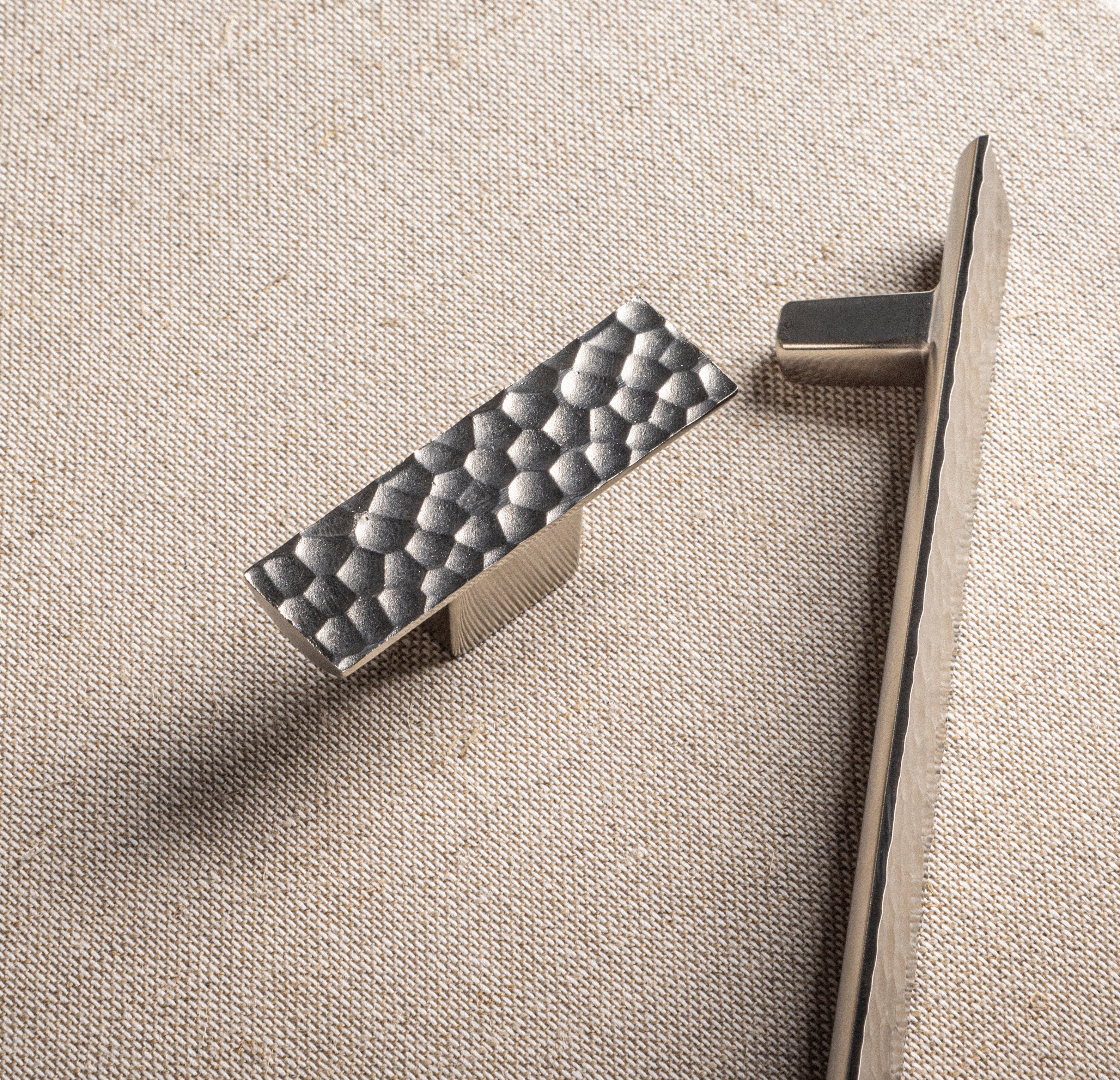CARVE collection in Satin NIckel by BRANDT Collective. A hardware collection in collab with Norm architects consisting of T-bars and pull bars.