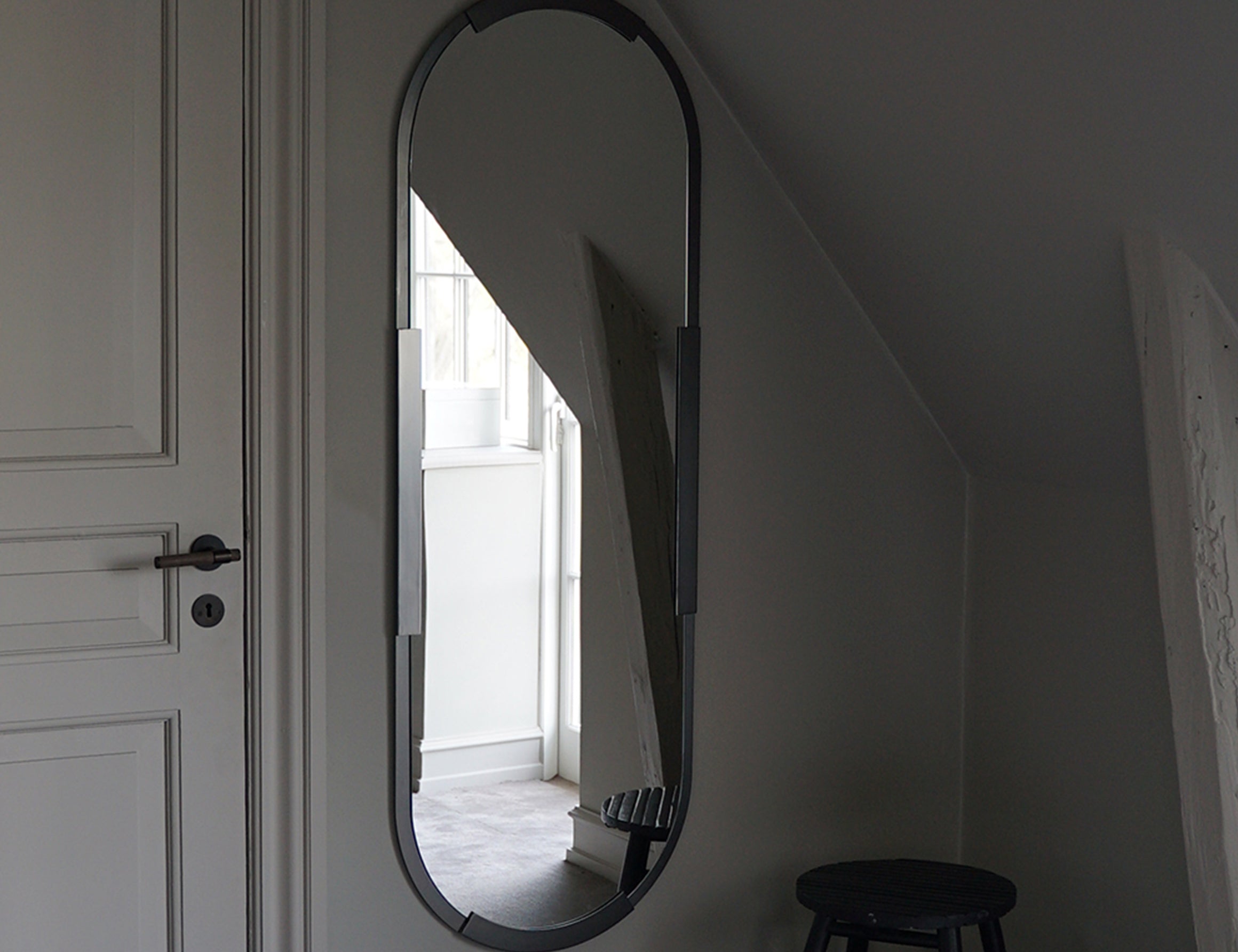 BRANDT Collective REFLECT mirror oval in size 54x150 in black gunmetal
