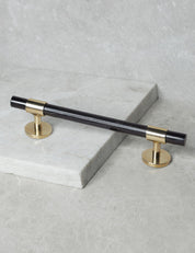 SIGNATURE 30 Pull bar handle 188 mm in Polished Brass/Black Horn. Luxury cabinet hardware made of solid brass by BRANDT Collective.