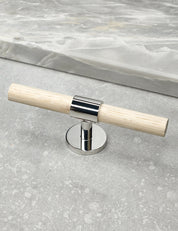 SIGNATURE 30 T-bar handle 113 mm in Polished Nickel/Oak. Luxury cabinet hardware made of solid brass by BRANDT Collective. 