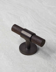 SIGNATURE 30 T-bar 60 mm in Burnished Brass/Wenge. Luxury kitchen hardware made of solid brass by BRANDT Collective.