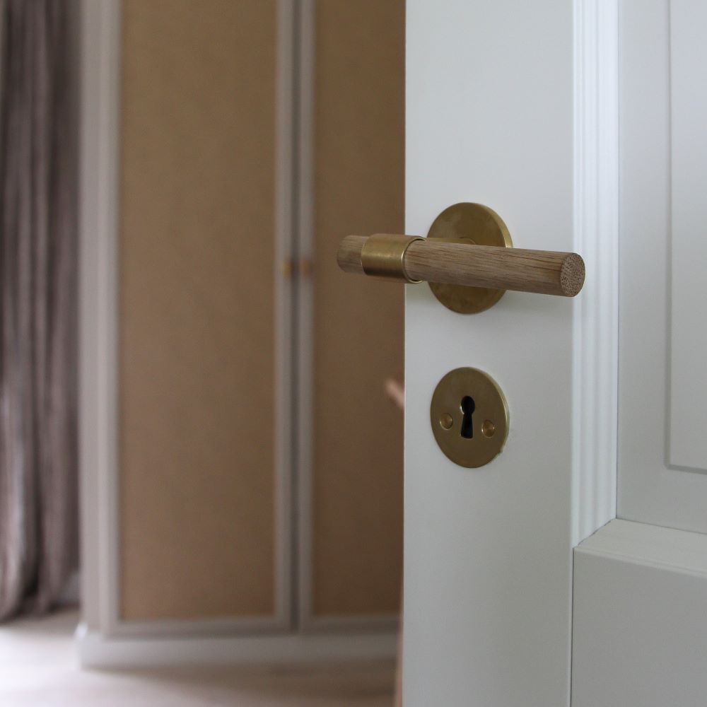 Oak. Modern door hardware made of solid brass by BRANDT Collective.