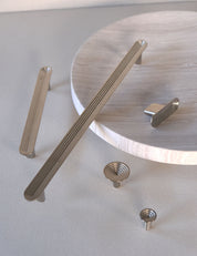 TERRACE collection in Satin Nickel by BRANDT Collective. A hardware collection in collab with Norm architects consisting of knobs, T-bars and pull bars.