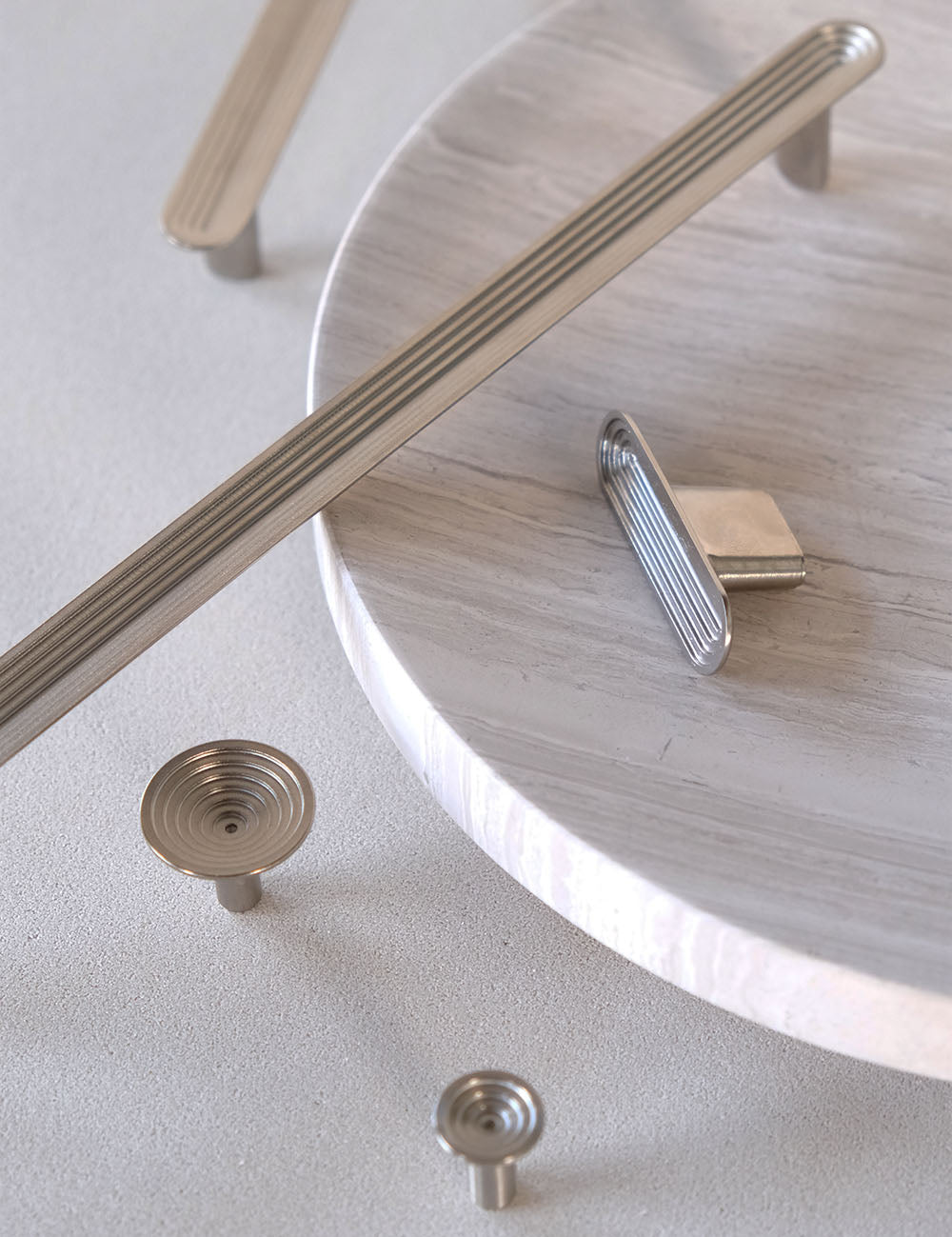 TERRACE collection in Satin Nickel by BRANDT Collective. A hardware collection in collab with Norm architects consisting of knobs, T-bars and pull bars.