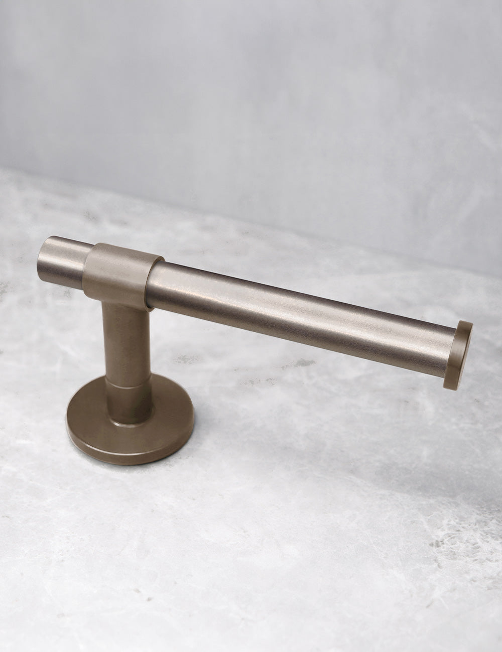 SIGNATURE toilet roll holder in Burnished Brass. Luxury bathroom hardware made of solid brass  by BRANDT Collective.