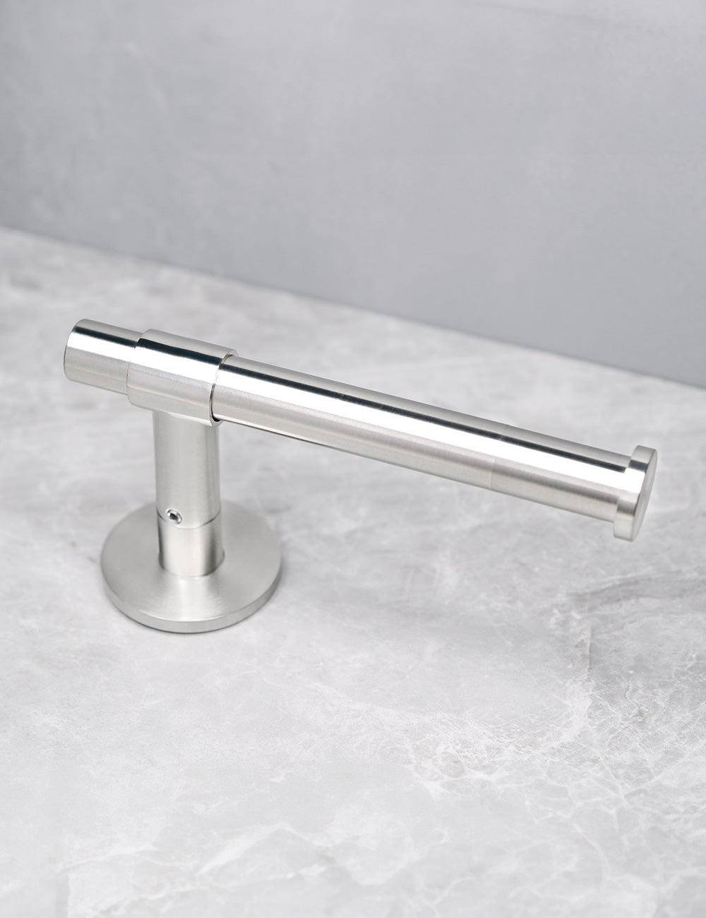 SIGNATURE toilet roll holder in Brushed Nickel. Luxury bathroom hardware made of solid brass by BRANDT Collective.