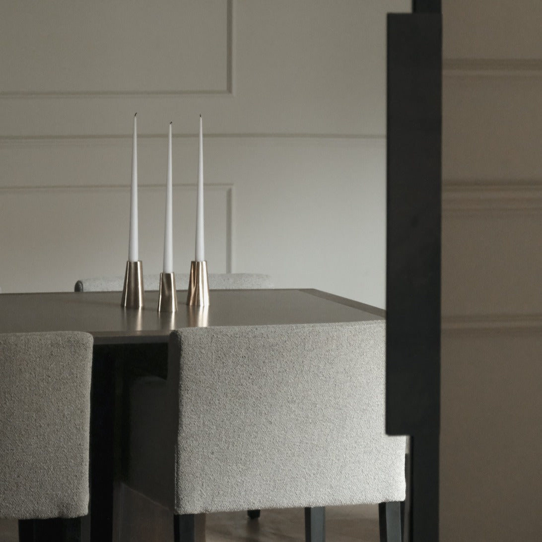 TRUNK candleholder in satin brass. Designed by Julie Brandt for BRANDT Collective