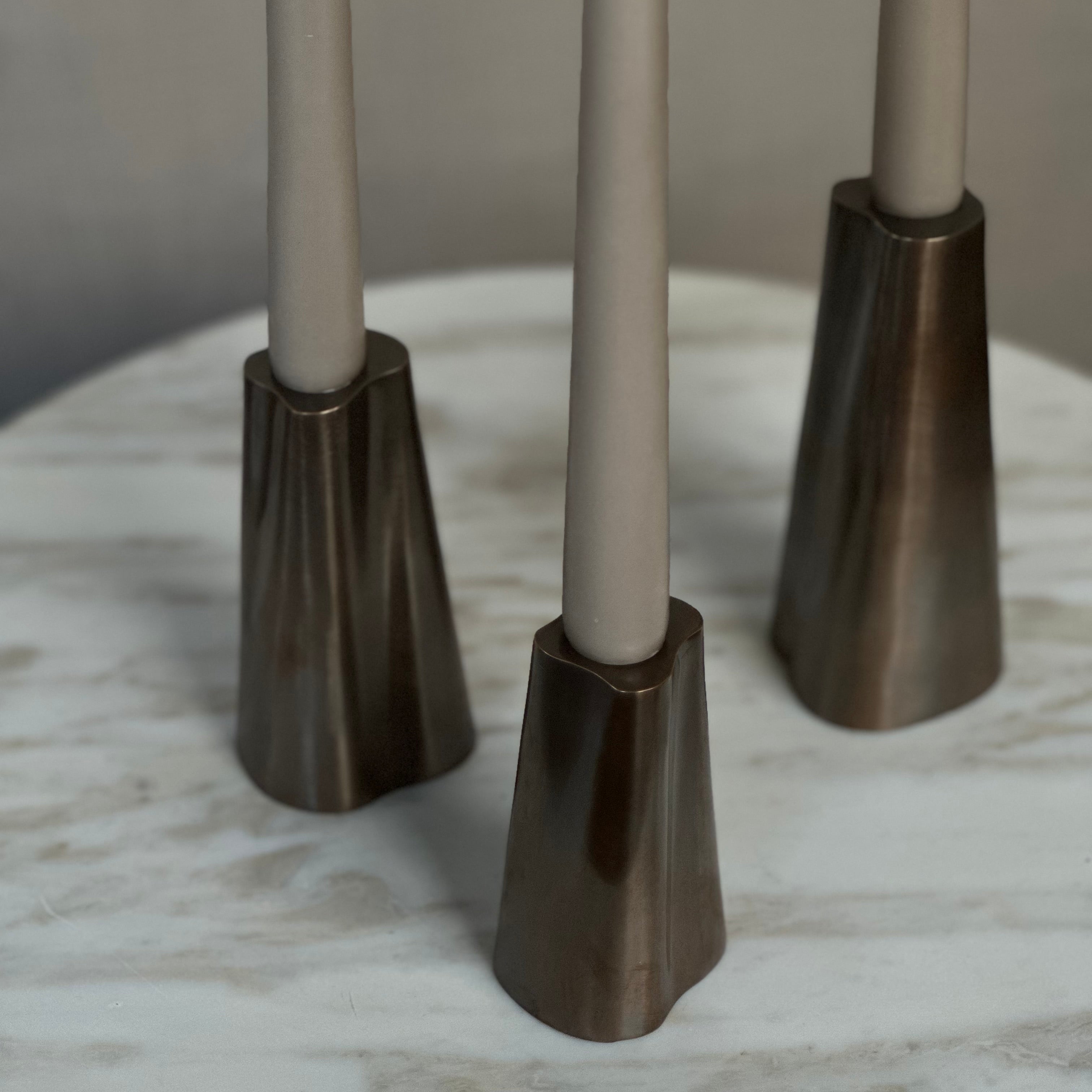 TRUNK candleholder in burnished brass. Designed by Julie Brandt for BRANDT Collective