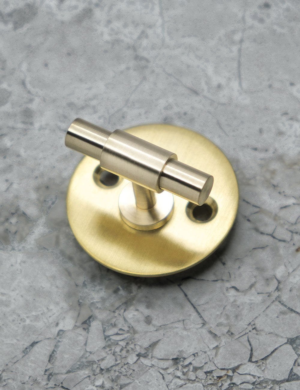 THUMBTURN lock in Brushed Brass. Elegant door hardware by BRANDT Collective.