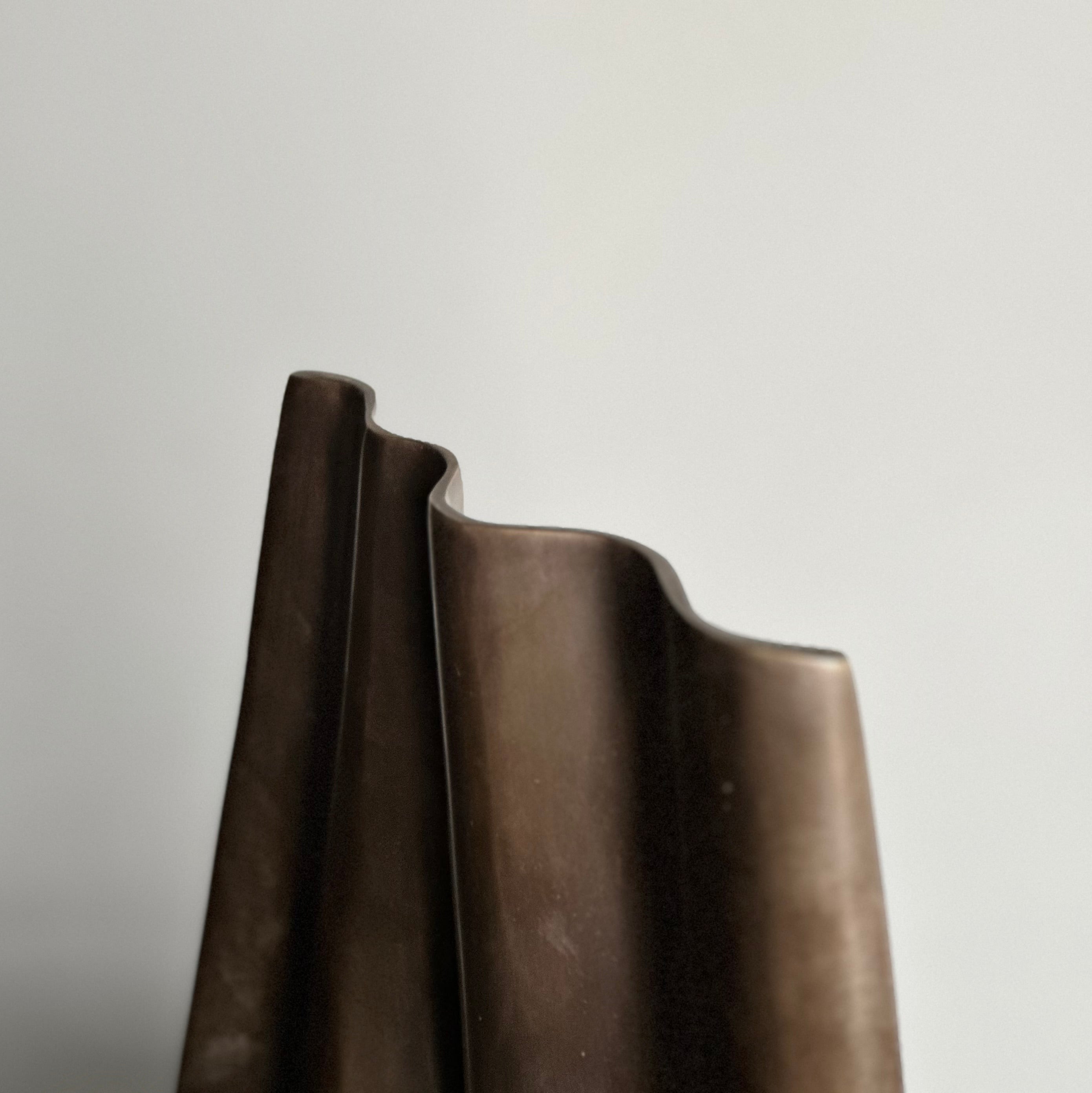 WALL sculpture in burninshed brass is designed by Julie Brandt for BRANDT Collective.