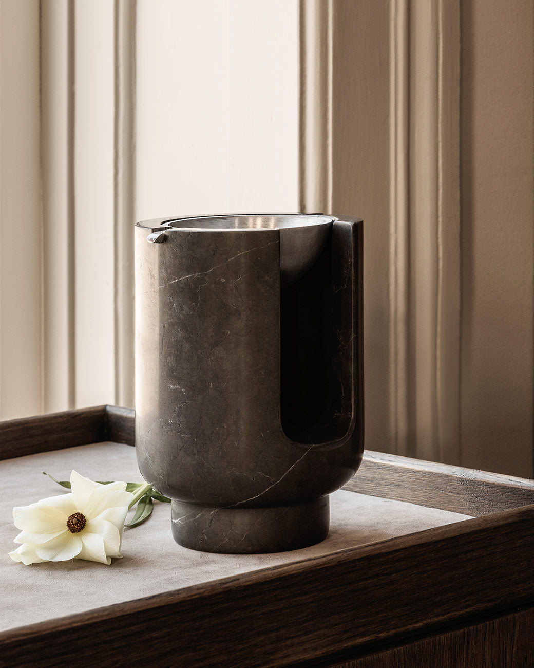 AURA Oil Burner diffuser from BRANDT Copenhagen with a marble base in Riyal Grey and metal top in satin aluminum
