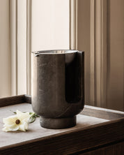 AURA Oil Burner diffuser from BRANDT Copenhagen with a marble base in Riyal Grey and metal top in satin aluminum
