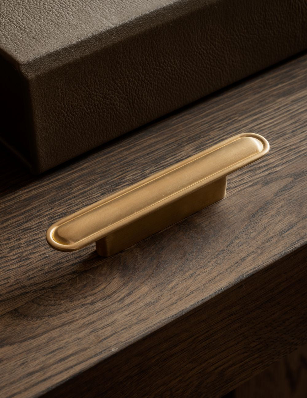 BUTTON pull bar 110 mm by NORM archtiects and BRANDT Copenhagen. Perfect as kitchen handle and cabinet hardware for luxury homes.