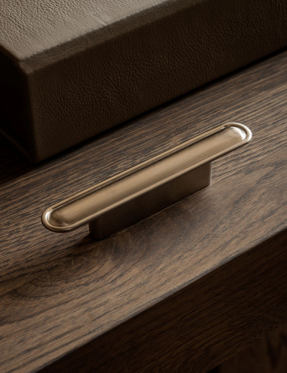 BUTTON pull bar 110 mm in satin nickel by BRANDT Copenhagen. A hardware collection in collab with Norm architects consisting of knobs, T-bars and pull bars for kitchens and cabinets.