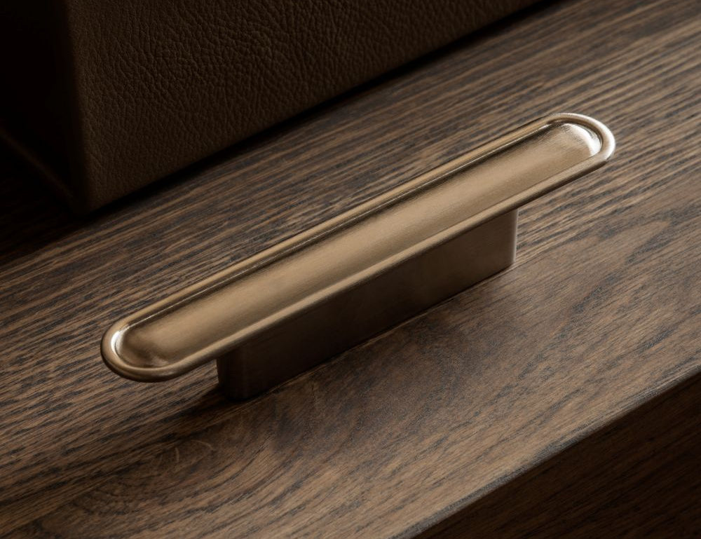 BUTTON pull bar 110 mm in satin nickel by BRANDT Copenhagen. A hardware collection in collab with Norm architects consisting of knobs, T-bars and pull bars for kitchens and cabinets.