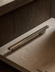 BUTTON pull bar 250 mm by NORM archtiects and BRANDT Copenhagen. Perfect as kitchen handle and cabinet hardware for luxury homes.