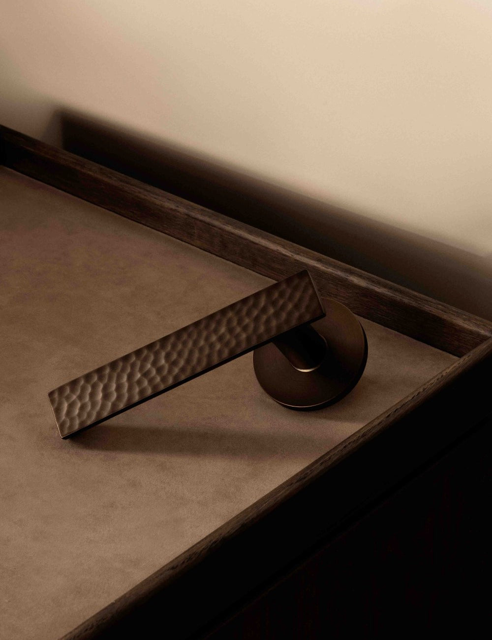 CARVE doorhandle set in Burnished Brass by BRANDT Copenhagen. Designed in collab with Norm architects.