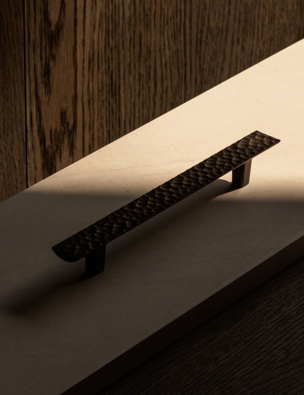 CARVE pullbar designed by NORM architects and BRANDT Copenhagen. A luxury cabinet hardware collection for kitchens and cabinets.