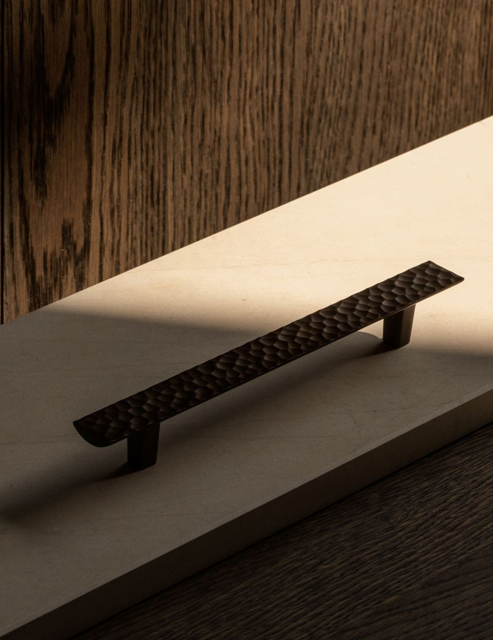 CARVE pullbar designed by NORM architects and BRANDT Copenhagen. A luxury cabinet hardware collection for kitchens and cabinets.