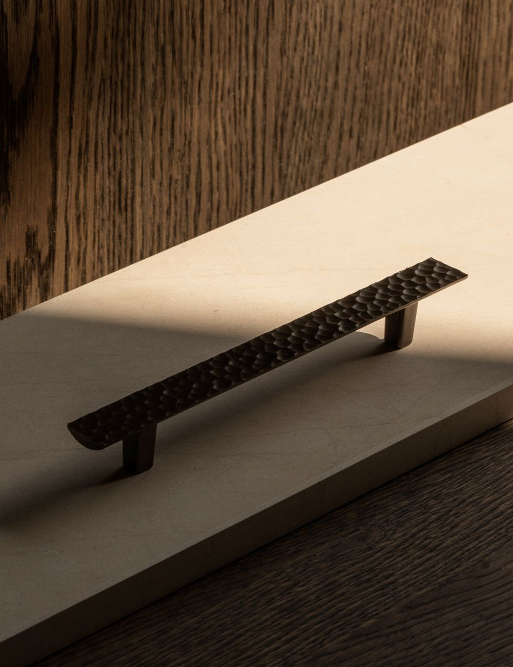 CARVE pullbar designed by NORM architects and BRANDT Copenhagen. A luxury cabinet hardware collection for kitchens and cabinets.