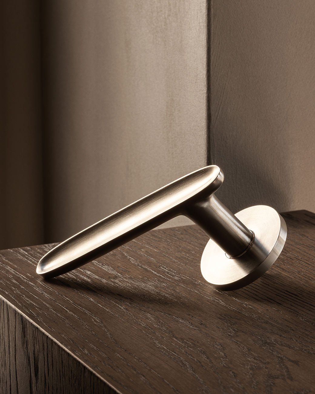 Leaf door lever handle in satin nickel by BRANDT Copenhagen. Designed in collab with Norm Architects.