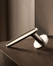 Leaf door lever handle in satin nickel by BRANDT Copenhagen. Designed in collab with Norm Architects.