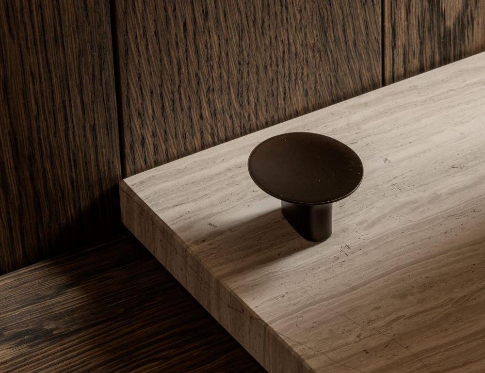 leaf hook round for wall mounting in burnished brass. Designed by Norm architects for brandt copenhagen