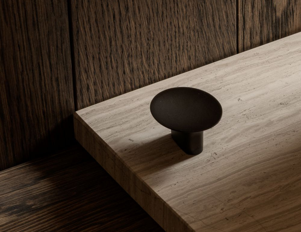 leaf hook round for wall mounting in burnished brass. Designed by Norm architects for brandt copenhagen.