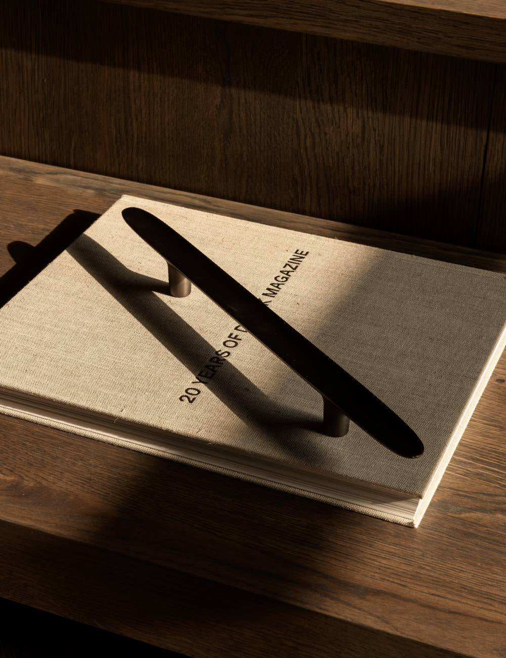 LEAF pull bar 400 mm in burnished brass by BRANDT Copenhagen and Norm architects. Kitchen handle in solid brass - ideal as appliance pull.