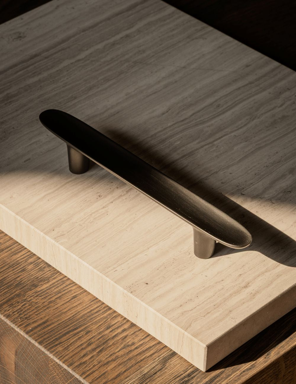 LEAF pull bar 160 mm in gunmetal black by BRANDT Copenhagen and Norm architects. Kitchen handle in solid brass.