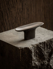 LEAF T-bar 65 mm in gunmetal black by BRANDT Copenhagen and Norm architects. Kitchen handle in solid brass - ideal for kitchen drawers and cupboard fronts.