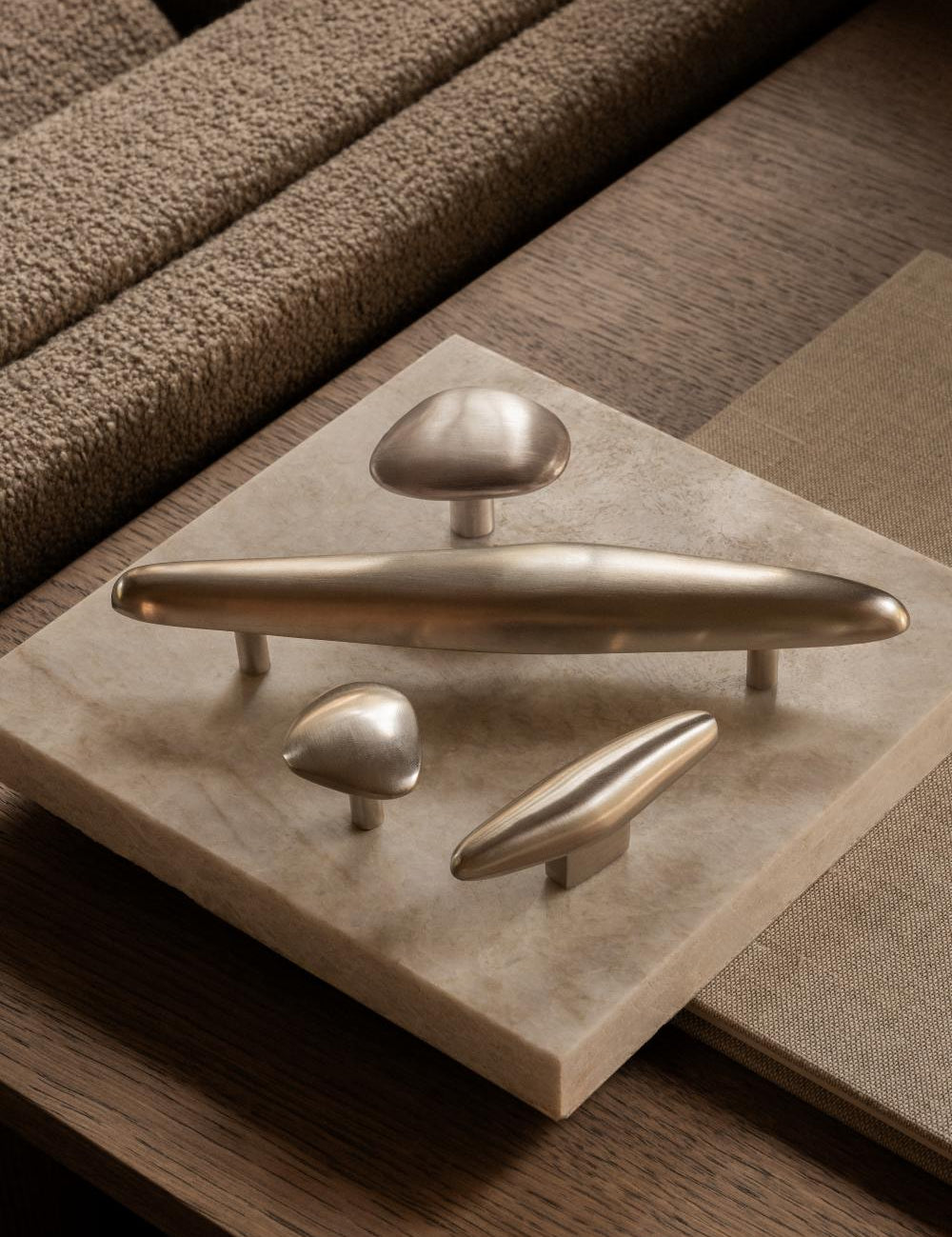 NOBLE hardware collection in Satin Nickel. Designed by Julie Brandt and is part of our organic shaped hardware collection with luxury cabinet and kitchen handles.