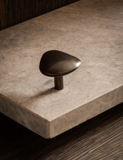 NOBLE knob in Burnished Brass Patina made of solid brass and organically shaped. Designed by Julie Brandt for BRANDT. Copenhagen. 