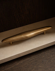 NOBLE pull bar long made of solid brass is part of our organically shaped hardware collections. Designed by Julie Brandt for BRANDT Copenhagen.