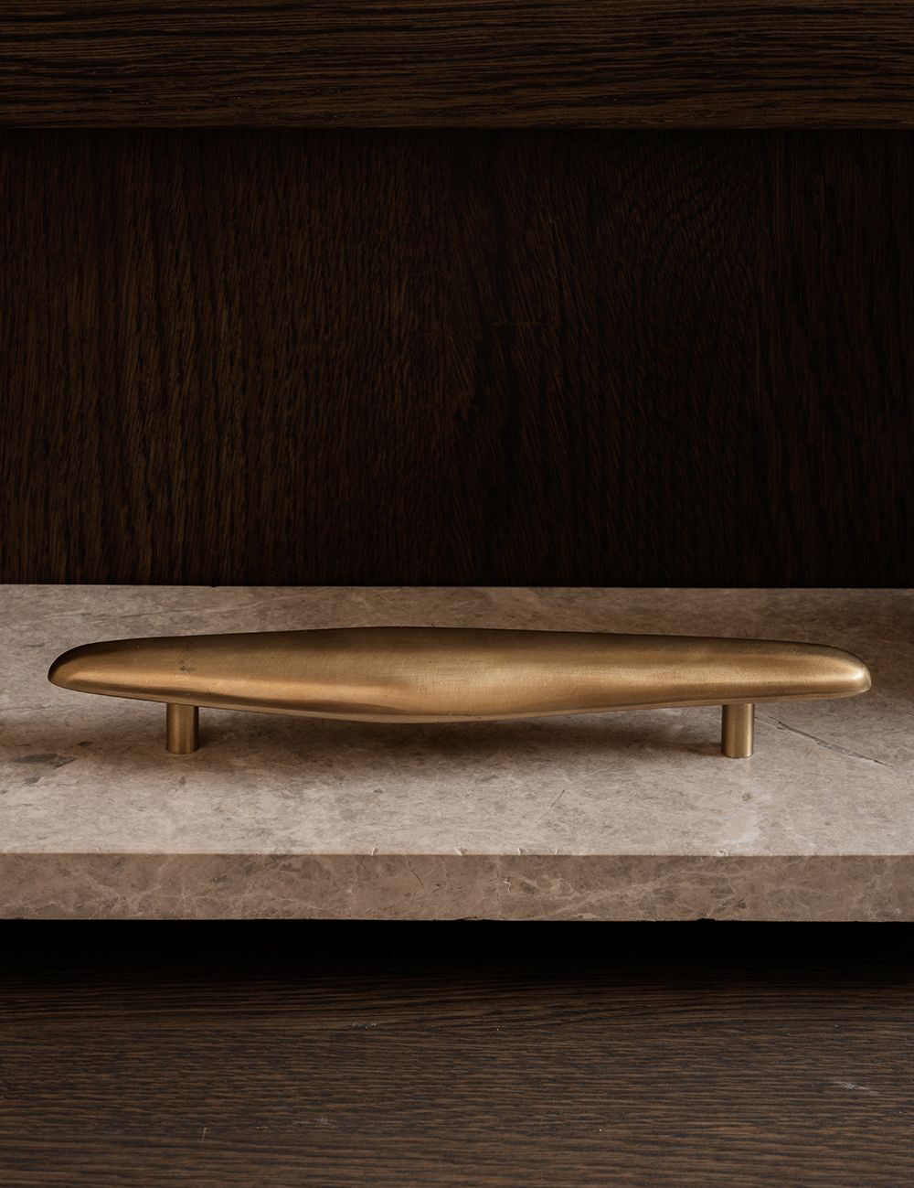 NOBLE pull bar long made of solid brass is part of our organically shaped hardware collections. Designed by Julie Brandt for BRANDT Copenhagen.