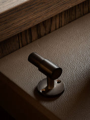SIGNATURE hook for tea towels or bathroom towels made of solid brass with finish in Burnished Brass. Designed by Julie Brandt for BRANDT Copenhagen.