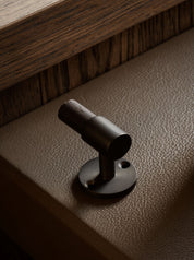 SIGNATURE hook for tea towels or bathroom towels made of solid brass with finish in Nearly Black and Wenge. Designed by Julie Brandt for BRANDT Copenhagen.